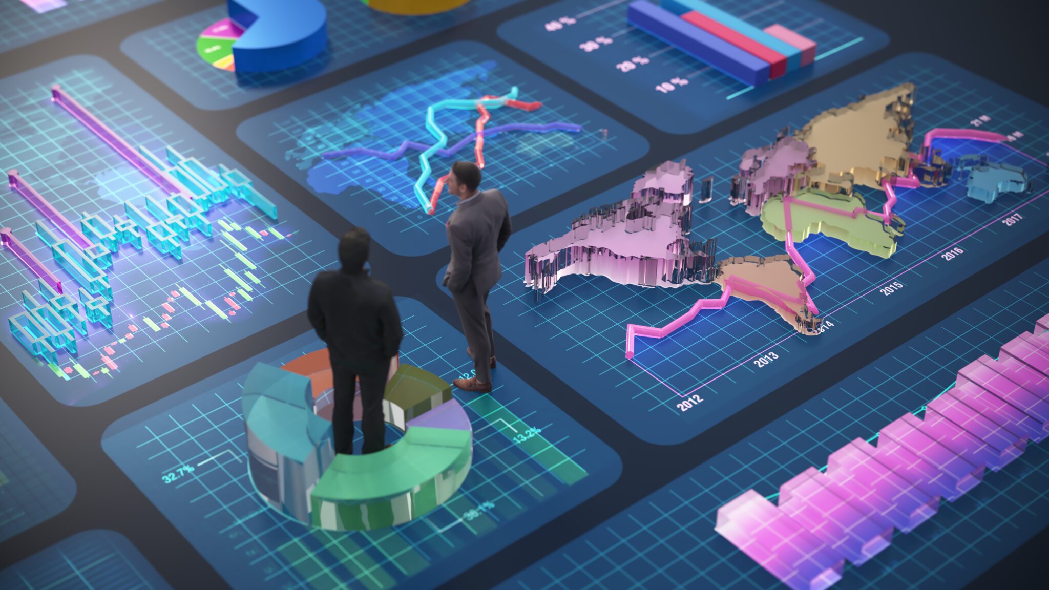 Two business professionals stand in a modern office, observing various digital displays showing graphs, charts, and data trends. They are engaged in a discussion about company performance.